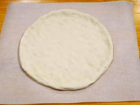 10 6 After the dough has risen about an hour until doubled in bulk, shape you pizza crust. I have a pizza stone and a pizza peel, so I size my crust to fit them.