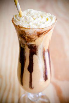 frappe covered in whipped cream & chocolate sauce.
