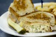 99 Jumbo lump crab cake on a roll, seasoned perfectly and broiled to perfection. Turkey Reuben $9.