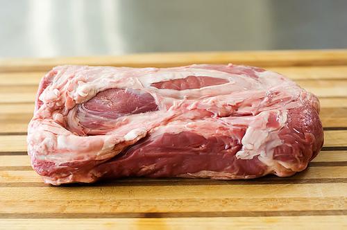 Unwrap the meat from the plastic or paper wrapping and rinse well. Now, see all that fat on top?