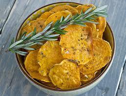 Sweet Potato Chips [Serves 4] 3 sweet potatoes 2 tablespoons coconut oil 1 teaspoon garlic powder ½ teaspoon sea salt PREPARE THE SWEET POTATOES. Preheat oven to 425 F.