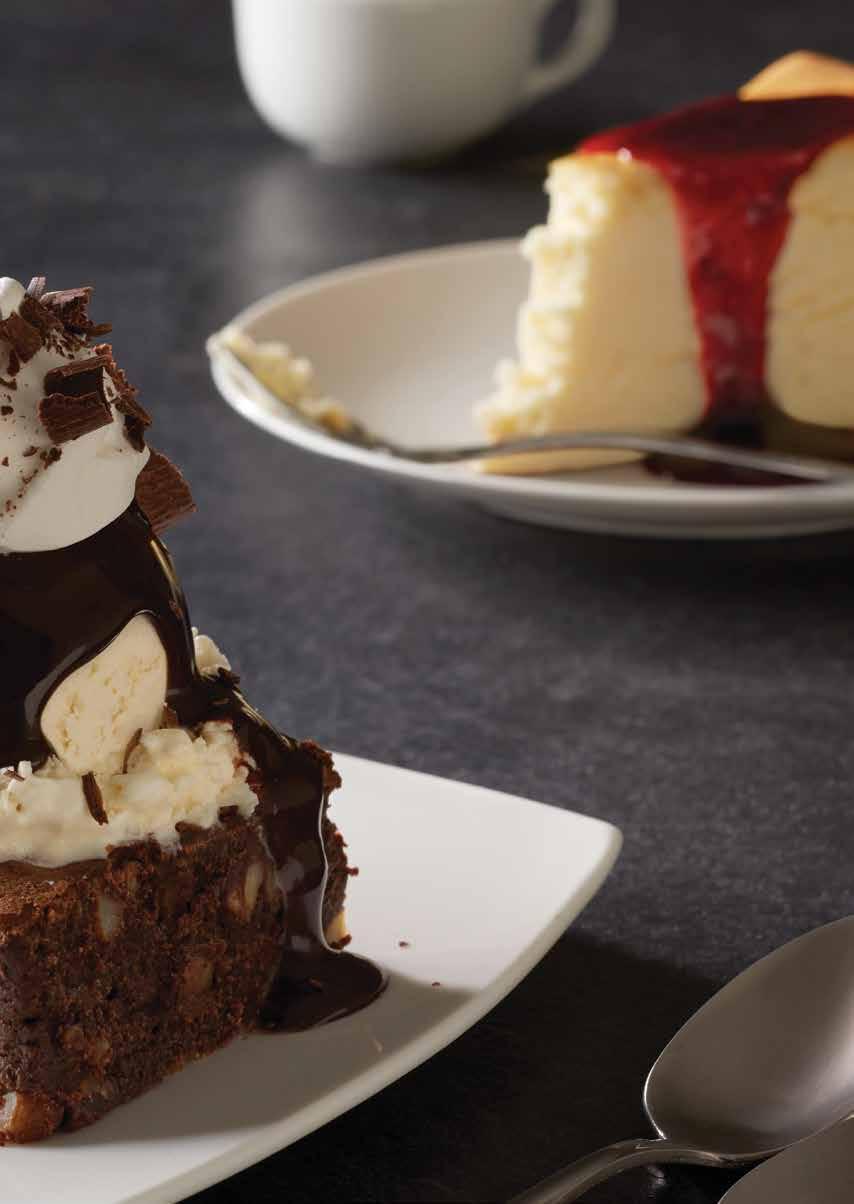 Irresistible DESSERTS Cheesecake Chocolate Thunder from Down Under * An extra generous pecan brownie is topped with rich vanilla ice cream, drizzled with our warm chocolate sauce and finished with