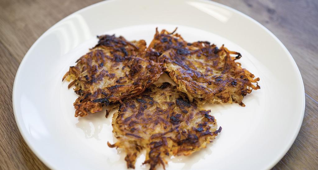 Potato rosti Serves 4 4 potatoes, grated 2 tablespoons oil 1. Place grated potato in a colander, rinse in cold water. 2. Squeeze out as much water as possible, place in a bowl. 3.