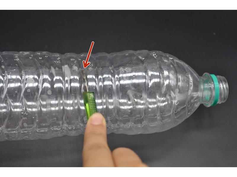 cap and cut the bottle in half using a