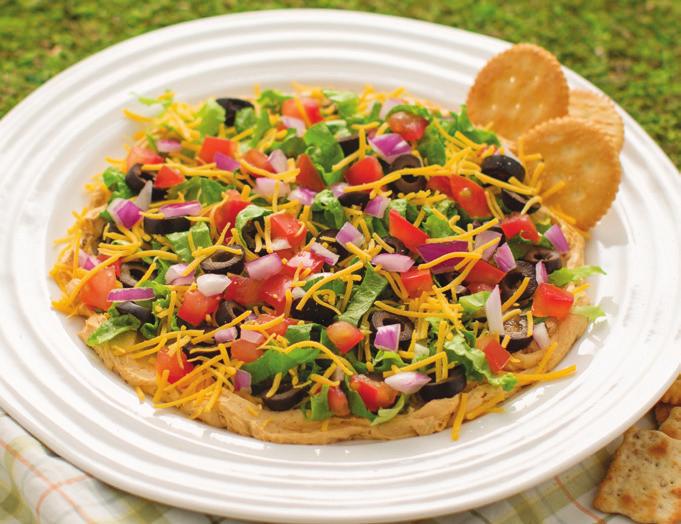 Zesty Layered Garden Dip 1 (8 ounce) package cream cheese, softened 1 packet Zesty Honey BBQ Dip Mix 1 cup shredded lettuce ½ (2.