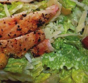 Caesar Salad Crisp Romaine lettuce tossed with our homemade, creamy Caesar dressing, Parmesan cheese and toasted croutons 8 With grilled chicken