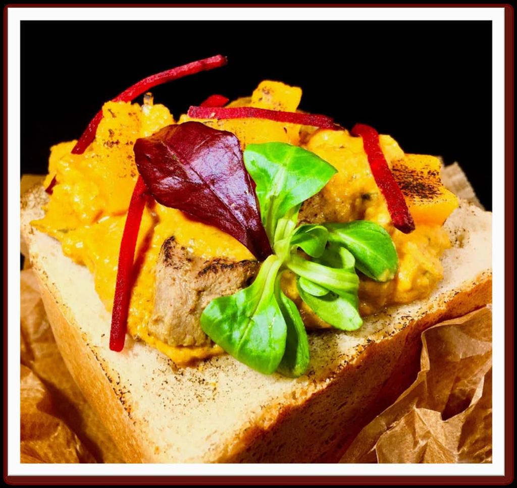 Bunny Chow Pieces of fall apart tender beef brisket in a rich coconut sauce with aromatic blend of delicate spices.