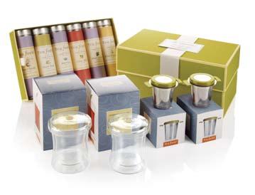 Everything you need to create a memorable moment for two is included in this beautiful keepsake box.. Ribbon Box Sampler (20 assorted infusers). Two porcelain Café Cups (8 oz).