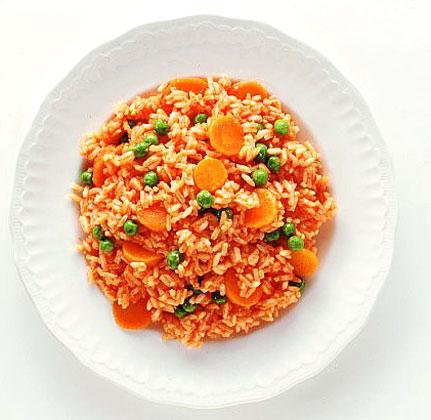 Mexican Rice: 2 tbsp. butter 1 c. long grain rice 1 to 1 1/2 tsp. onion powder 1 to 1 1/2 tsp. garlic powder 1 to 1 1/2 tsp. cumin 2 c. water 1/2 to 1 c. tomato sauce 1. Melt butter in skillet.