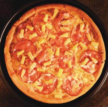 Would you like to try this spicy pizza? You don t have to go to Hawaii to try Hawaiian pizza.
