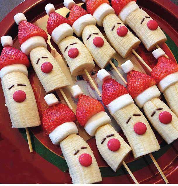 BANANA SANTAS Prep time: 30 mins Makes 8 MAKE WITH KIDS 4 bananas Punnet of strawberries Marshmallows (normal size and mini) Chocolate sugar strand sprinkles Smarties Honey (for sticking the eyes and