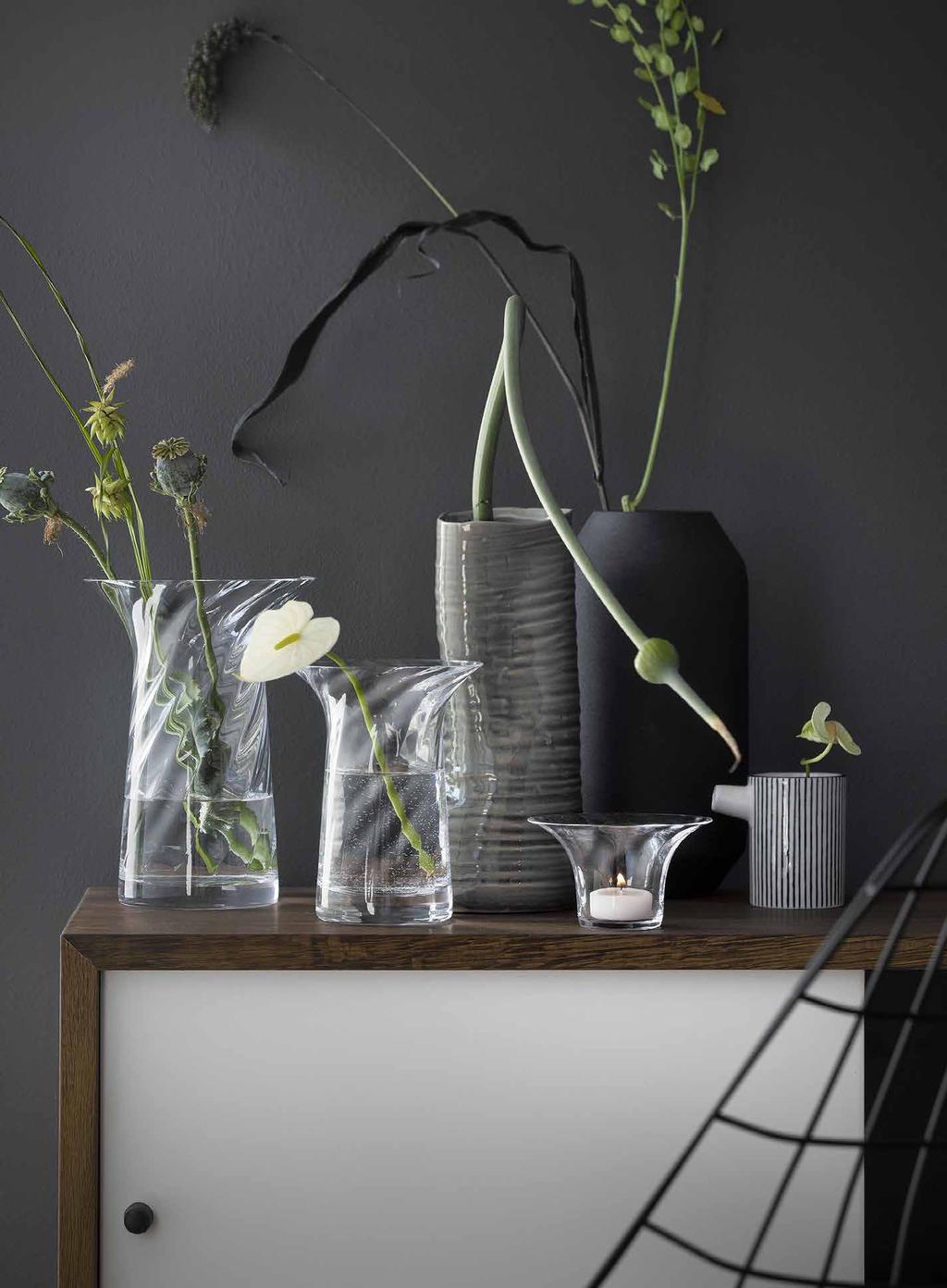 TIP Place these beautiful vases on the stairs to
