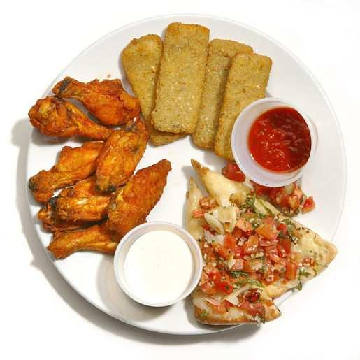 What you're served Appetizer platter from TGI Friday's: Nine chicken wings and 1/4-cup bluecheese sauce, four mozzarella