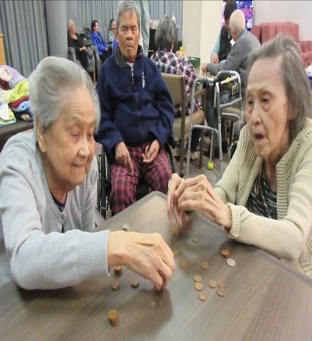 The residents enjoy activities such as folding,puzzles,listening to music, sorting and other tasks.