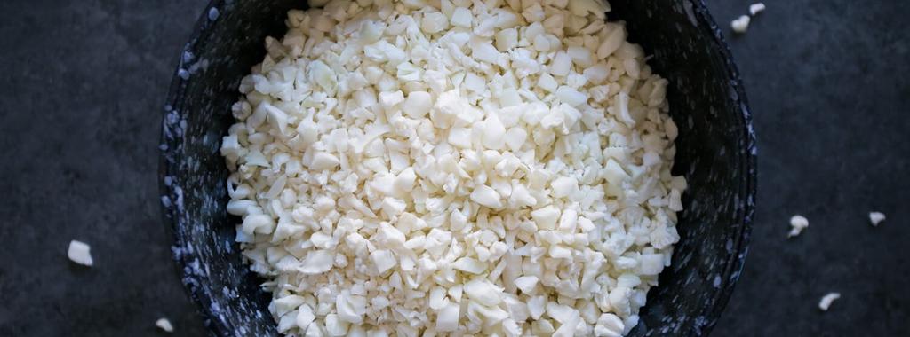 Cauliflower Rice 1 ingredient 10 minutes 4 servings 1. Add cauliflower florets to the food processor. Process until the cauliflower has a rice-like consistency.