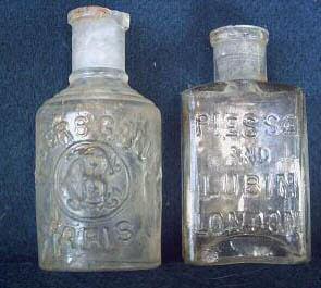 Below two perfume bottles.