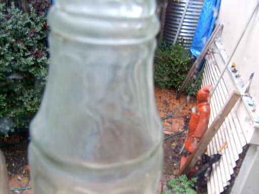 Above is a detail of the vinegar bottle with