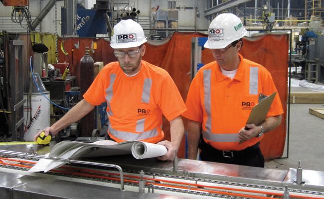 Ed Michalski (left) with brother Dave, checking specs for a customer Ed Michalski, CEO PRO Engineering and Manufacturing, Inc PRO Tech Notes TM is a publication of PRO Engineering and Manufacturing,