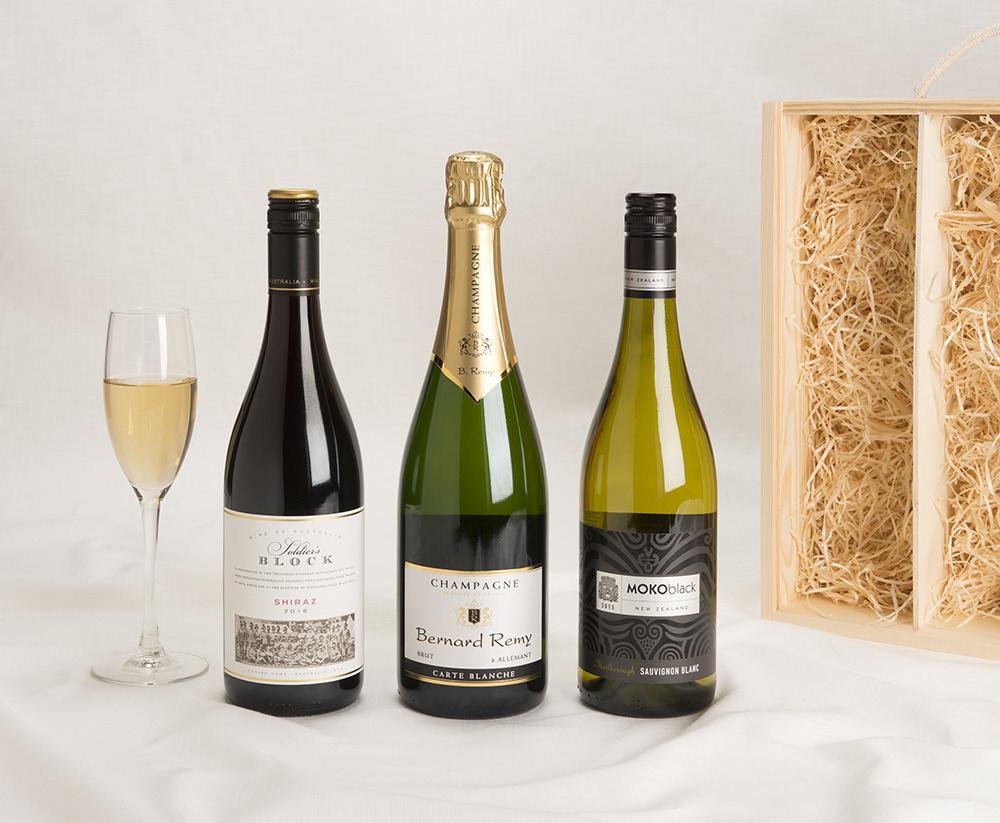 3 bottle Wine Gift Champagne Bernard Remy, Carte Blanche (France), Soldiers Block Shiraz (Australia), Moko Black Sauvignon Blanc (New Zealand) Packed in wooden gift box with sliding lid 52.