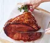 For even slices, use a large sharp knife to cut the ham crossways and at a slight angle to the bone.