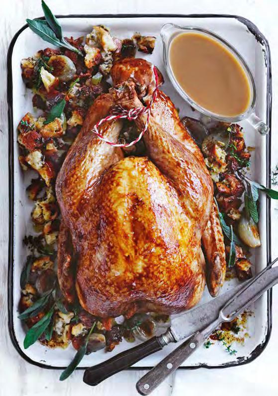 TRY THIS RECIPE Go all out with Curtis Stone s traditional roast turkey teamed with an easy-to-bake bread and herb stuffing.