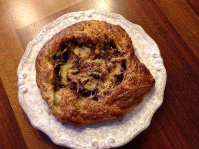 Onion Tart Food and Wine by Kelsie Kerr Servings: 4-6 Dough 1⅓ sheets of Puff Pastry Filling 4 tablespoons unsalted butter 2 1/2 pounds sweet onions, thinly sliced 6 thyme sprigs 2 tablespoons crème
