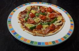 Homemade Pizza Preparation time: 15 minutes Cooking time: 15 minutes 4 light flat bread bases 20cm 8 tbsp.