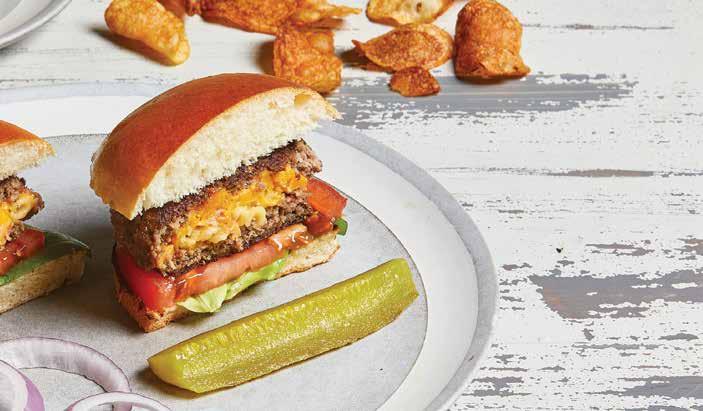 Stuffed Bacon Mac & Cheese Burgers Serves 4 1 ½ lb ground beef 1 /3 cup shredded cheddar cheese ¾ cup macaroni and cheese 3 strips cooked bacon, quartered 4 brioche rolls, cut in half ½ cup margarine