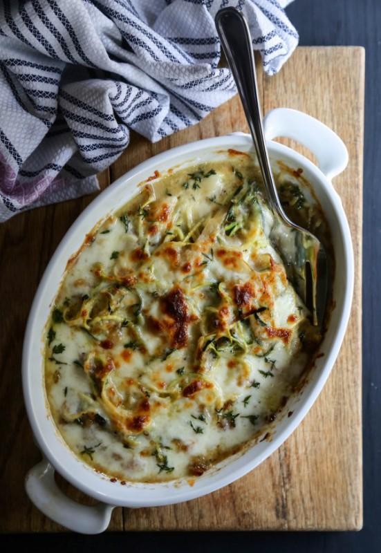 French Onion Zoodle Bake Yield: Serves 4 Prep Time: 20 minutes Cook Time: 45 minutes Ingredients: 2 1/2 cups zucchini noodles 1 large yellow onion, sliced thinly 1 teaspoon granulated sugar 1