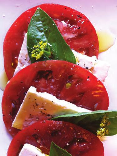 Tomato, Feta and Basil Salad continued On a small salad plate, arrange slices of tomato and feta so that they overlap.