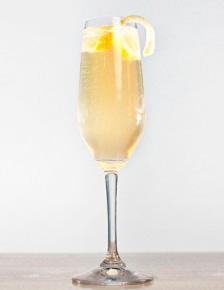 Stir, and strain into a chilled Champagne flute. Top with the Champagne and garnish with an orange twist.