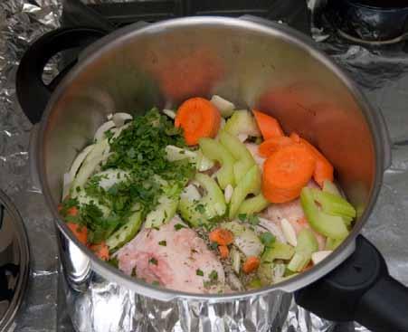 If it is not under the surface of the water add more water to cover it. Although the following pictures show my pressure cooker, you can just as easily use a stock pot.
