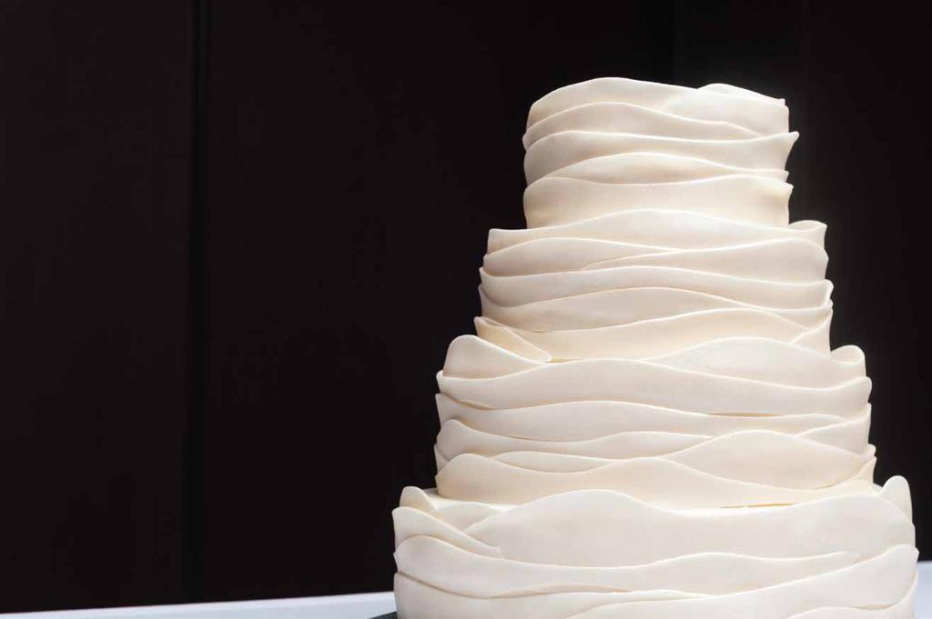WEDDING CAKES All of our wedding cakes are custom made to your specifications.