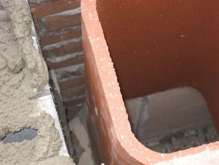 Step 7. Setting the 1st Flue Liner and Building the Chimney Using refractory mortar, attach the first flue liner to the smoke dome and proceed with normal chimney construction (Fig. 15).