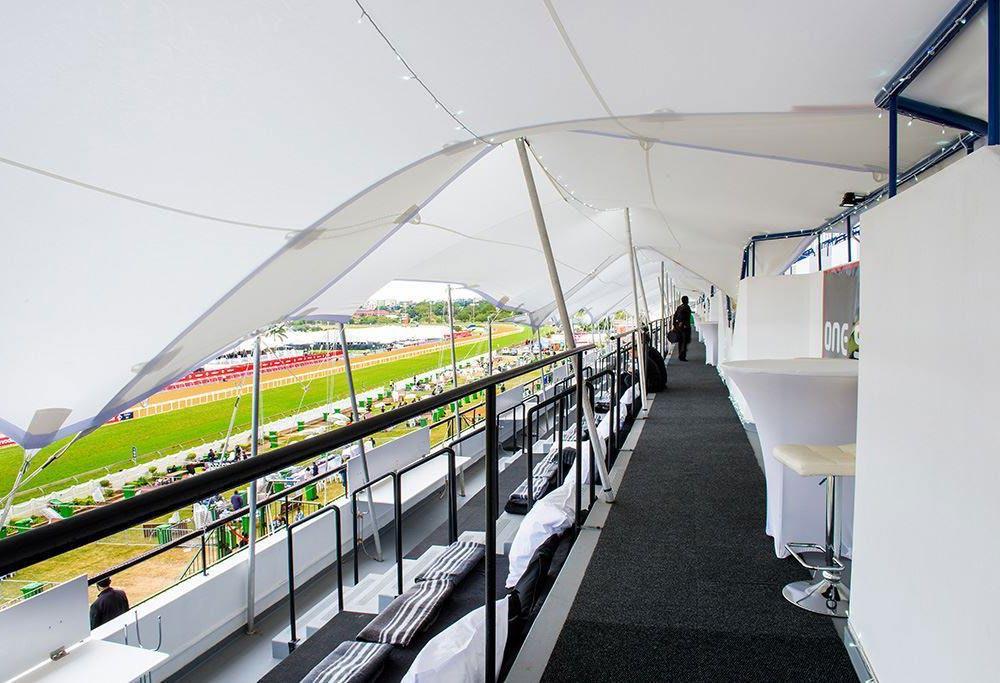 OUTSIDE BALCONY OPEN AIR HOSPITALITY PACKAGE Entrance to Greyville race course and into the One Stop VIP suite Race cards provide with access to private totes, as well as Gold Circle staff with
