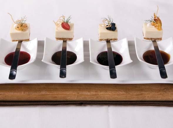 Place each garnished cheesecake piece onto a fork
