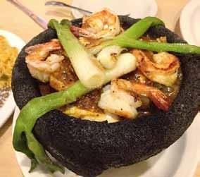 El Rodeo Classics Molcajete Molcajete A hot stone bowl filled with ribeye steak, chicken, shrimp, poblano pepper and scallions 18.