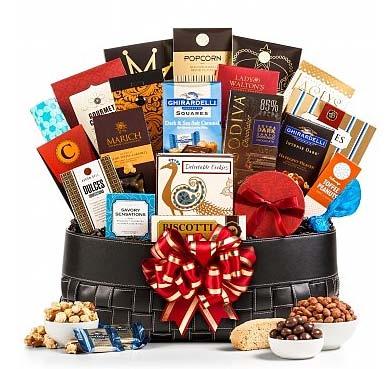 Holiday Extravagance Gift Basket A deluxe assortment of delicious treasts in a gorgeous keepsake basket that is perfect