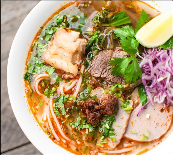95 Combination of rice noodle soup with eye round steak, lean brisket, well -done flank, soft tendon, tripe, and meatballs P14. Tender Chicken Pho... Phở Gà P15.