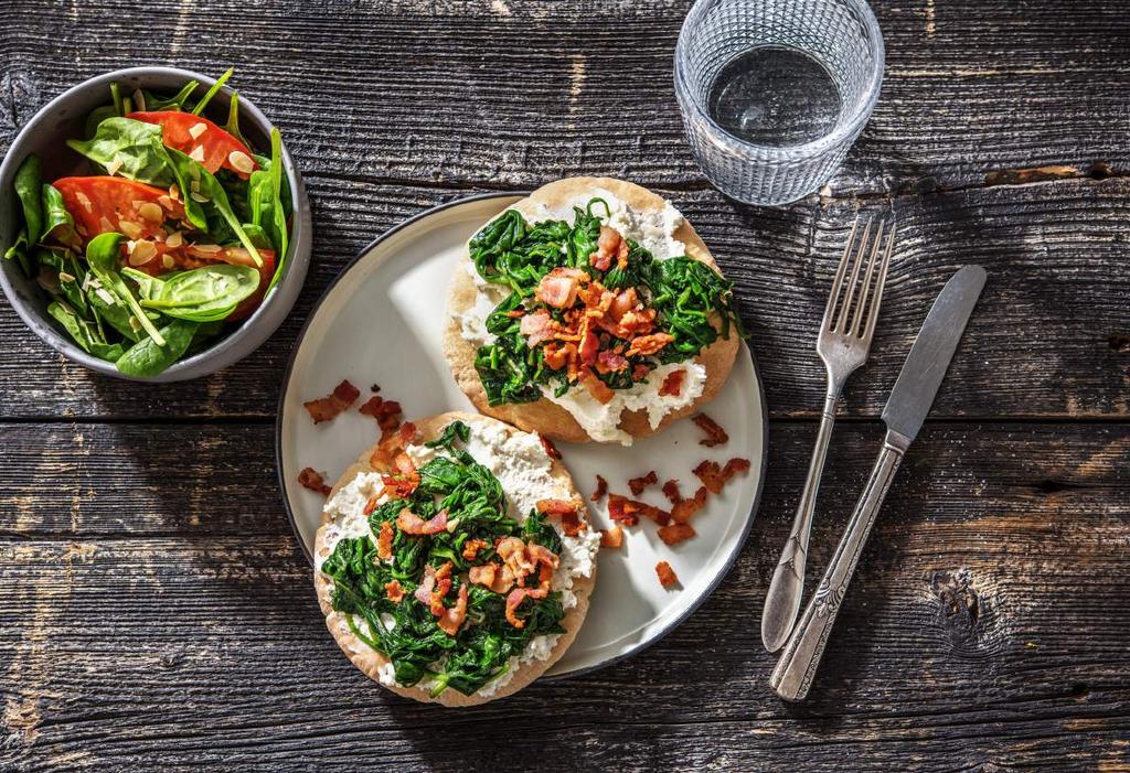 PITA-PIZZA WITH RICOTTA, SPINACH AND BACON CUBES With a refreshing salad White pita