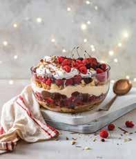 Repeat with another layer of panettone, raspberries and hazelnuts. Drench properly in remaining liqueur.