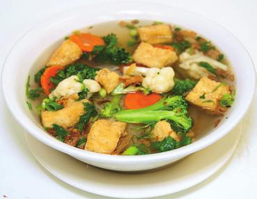Stir Fried Vegetables & Tofu on Steamed Rice..13.95 Rau Cäi & Tàu Hû Xào và CÖm Tr ng 59.