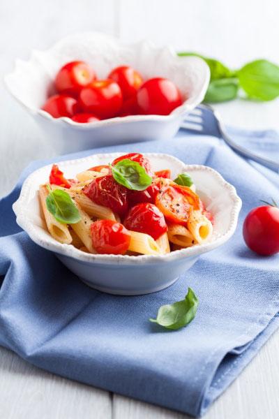 Quick Tomato Pasta Serves: 4 500g dried Penne 10 Cherry Tomatoes* small bunch Basil 4 tbsp Olive Oil Salt & Pepper *must be very ripe 1.