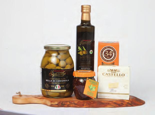 tasty gift giving ideas A Touch of Class Olive Wood Cheese Board Martelli Sundried Tomatoes Minasso Black Olives Spread