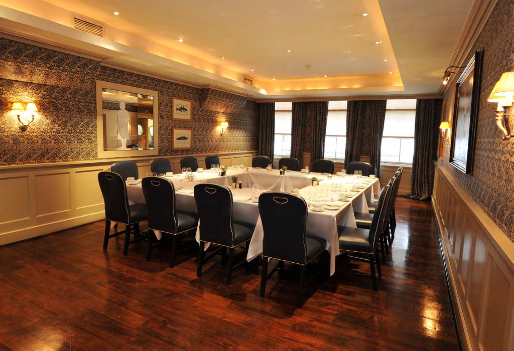 T H E R I B R O O M The Rib Room combines William Morris design blue and white fabric on the walls,