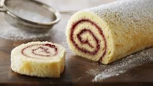 Swiss roll Ingredients 2 eggs 50g plain flour 50g caster sugar 2-3 tbsp jam Sieve Mixing bowl Electric whisk Knife Baking tray Metal spoon Spatula Grease proof paper with sugar on Cooling rack Don t