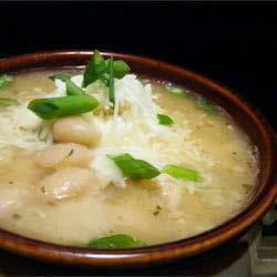 Easy White Chili K I D F R I E N D L Y 2 tablespoons olive oil 2 onions, chopped 4 cloves garlic, minced 4 cooked, boneless chicken breast half, chopped 3 (14.