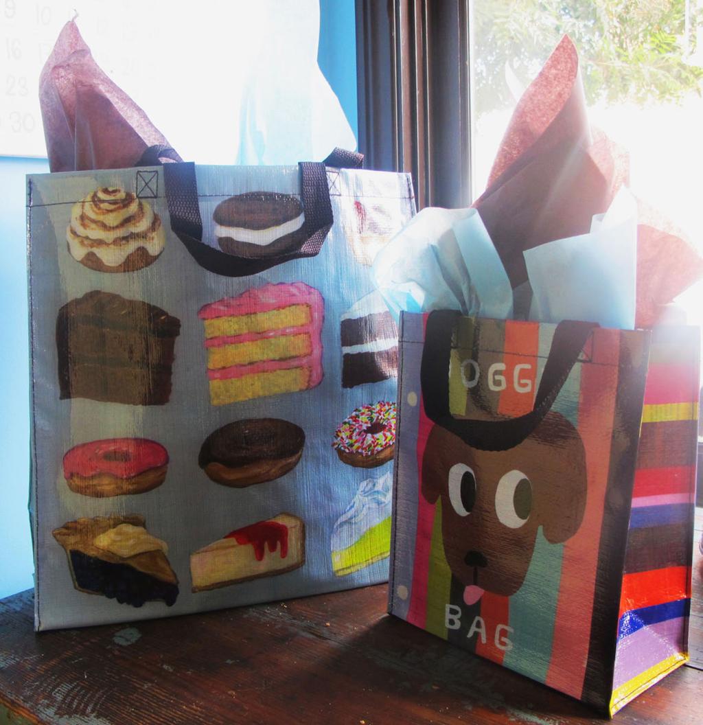 Gift Totes Large $100, Small $50 Large tote - $100 A recyclable shopper tote bag filled with mini cupcakes, bars, brownies, doughnut muffins and
