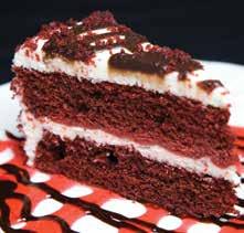 A moist triple layer chocolate cake is filled with
