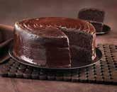 99 A round chocolate sponge cut in half, filled and decorated with